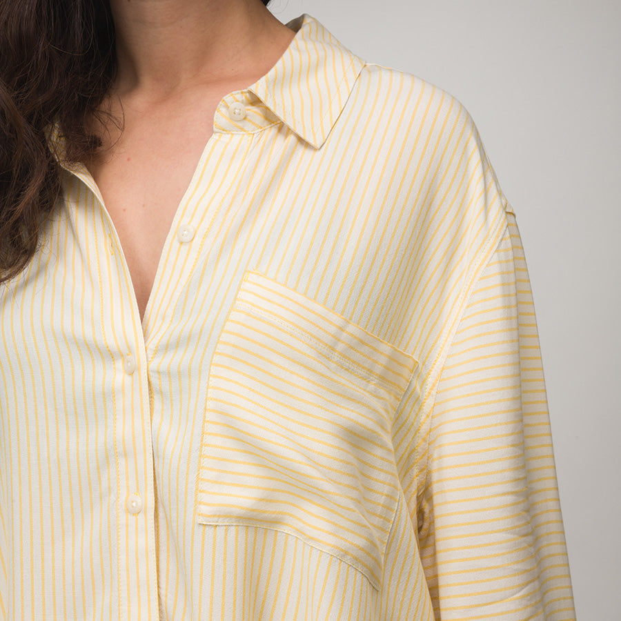 Ellie Button Up showing left shoulder and chest pocket, yellow striped beach-inspired comfortable women's apparel.