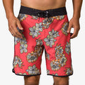 Front view of men's Tanner Boardshort with floral pattern and black waistband, designed for beach comfort and durability.