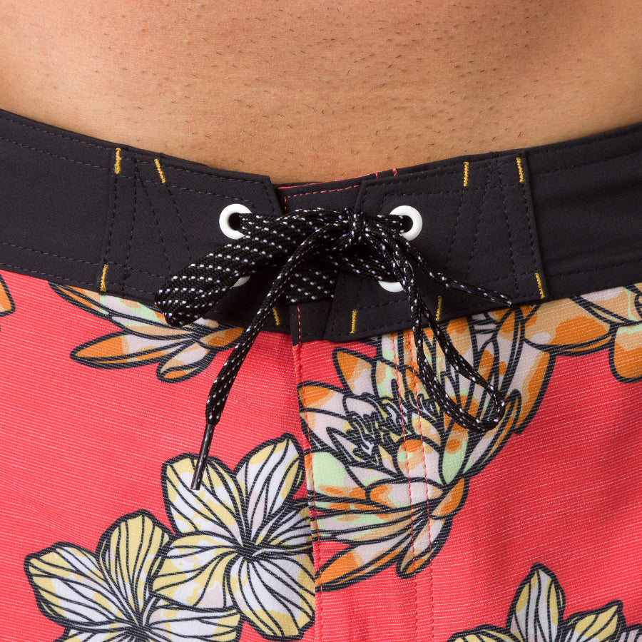 Close-up of the waist area on Tanner Boardshort with black lace and floral coral pattern, surf-inspired comfort design.