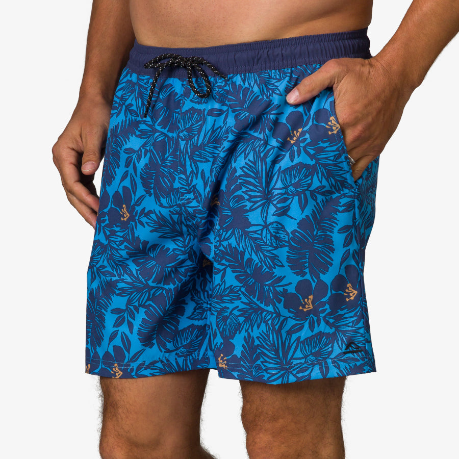 Front view of men's Felix Boardshort in blue with tropical leaf print, surf-inspired design for beach comfort.