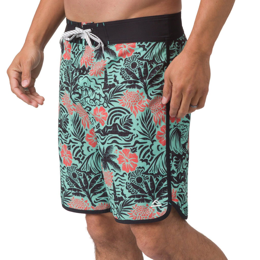 Front view of men's Fayder Boardshort in teal with coral floral print and black waistband, beach-inspired comfort design.
