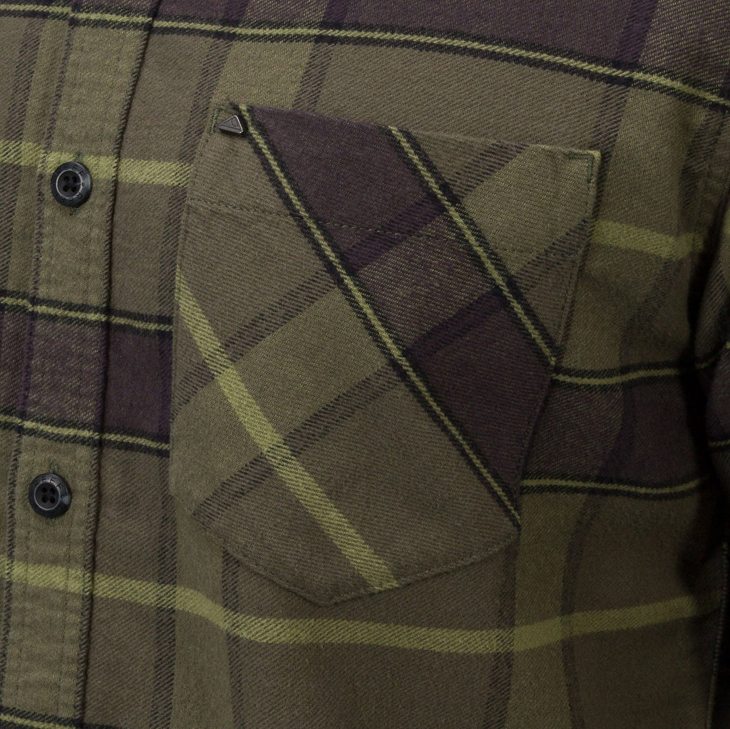 Close-up of the chest pocket on the Anders Long Sleeve Woven Shirt in green plaid, surf-inspired casual apparel.