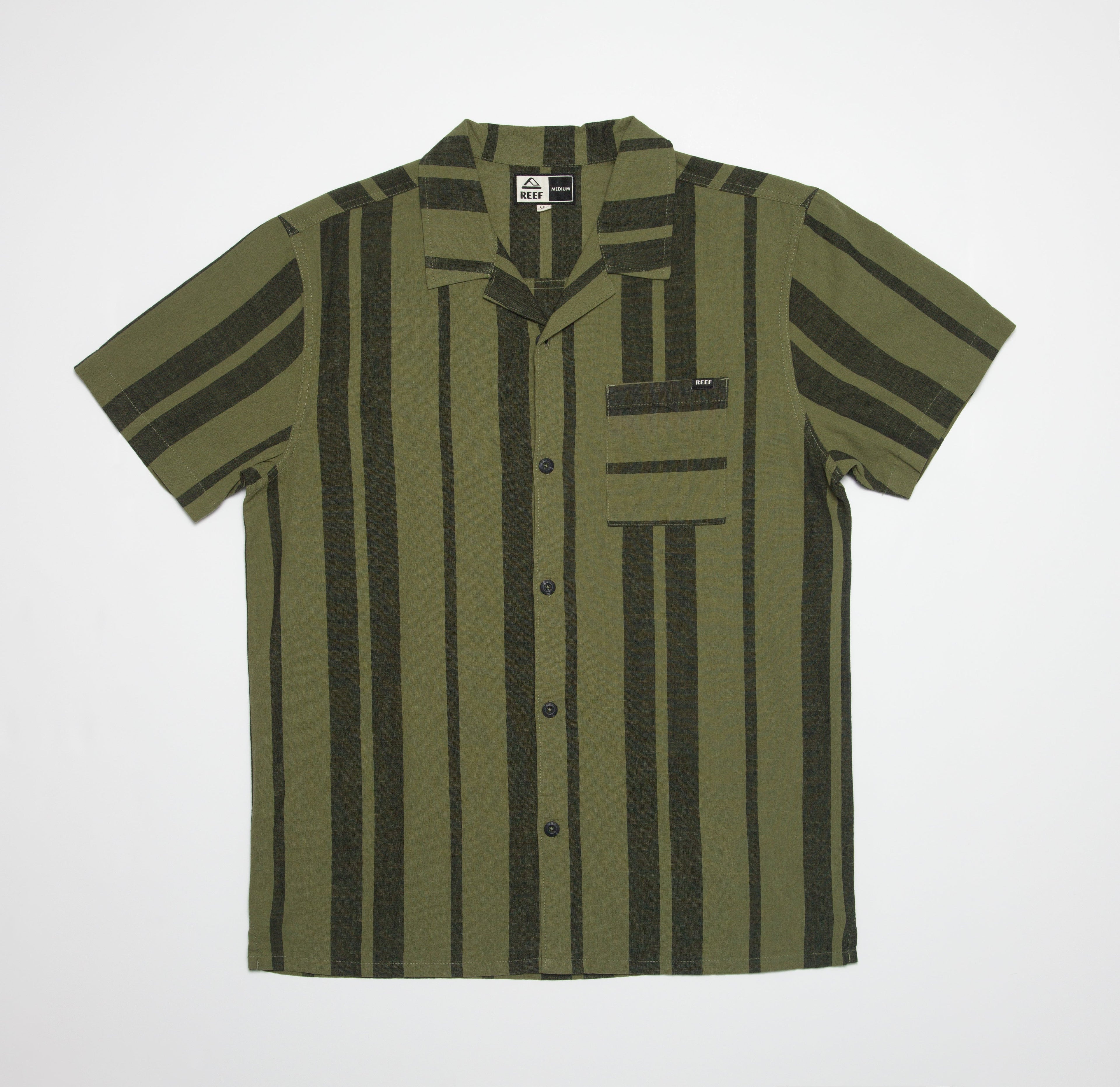 Flat lay of olive and dark green striped Angelo Short Sleeve Camp Shirt with front pocket and button closure designed for beach lifestyles.