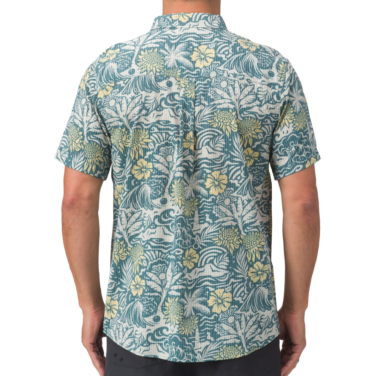 Back view of Eugene Woven Shirt in green floral pattern, perfect for beach-inspired, comfortable men's apparel.