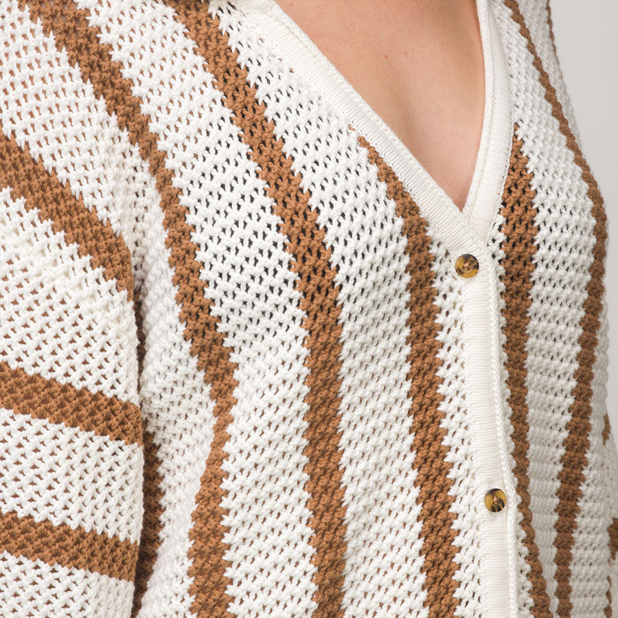 Close-up of Mika Button Down Top showing brown and cream open knit stripes and button detail on women’s beach-inspired apparel.
