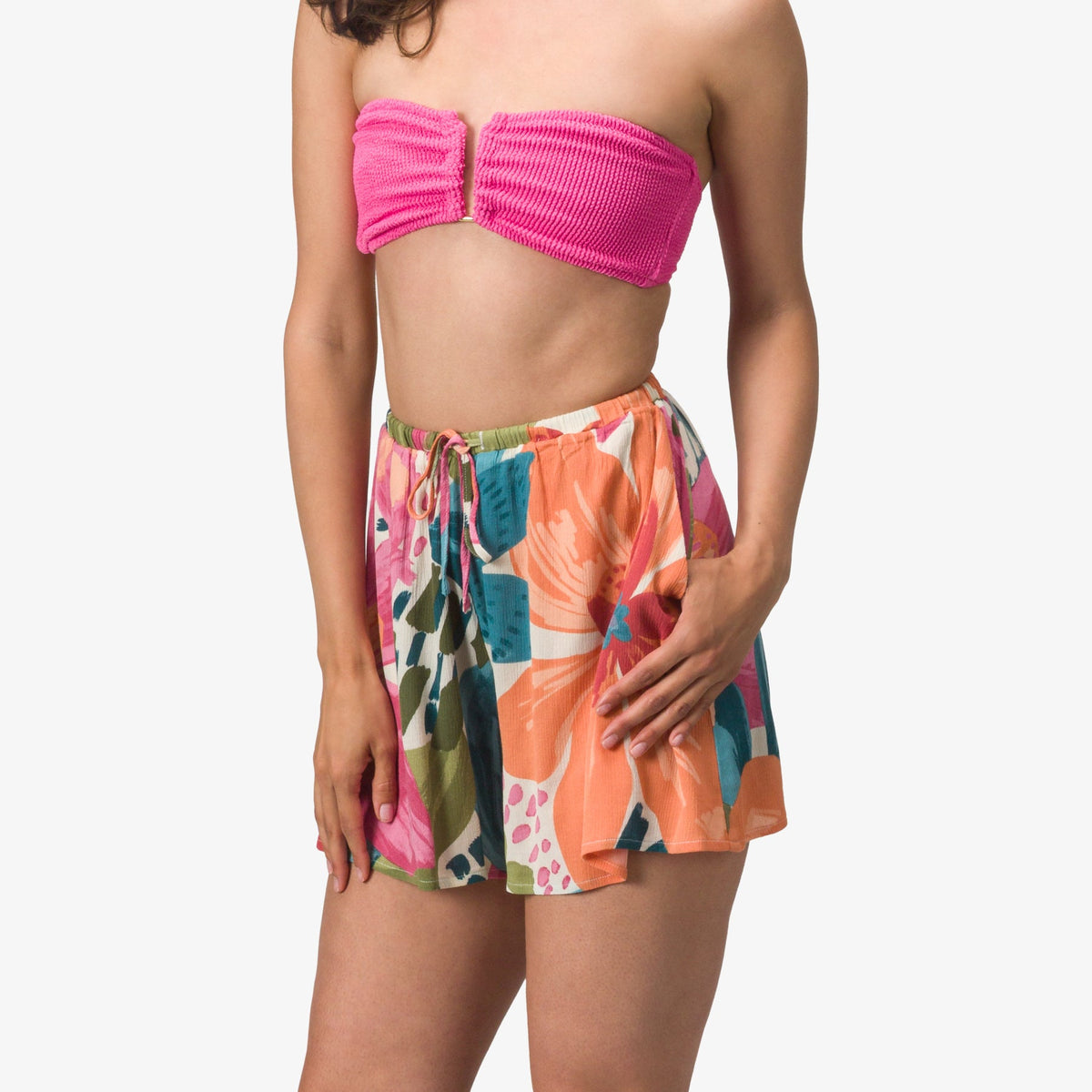 Front view of Eve Flutter Short with vibrant floral pattern, lightweight fabric, perfect for beachwear and active lifestyles.