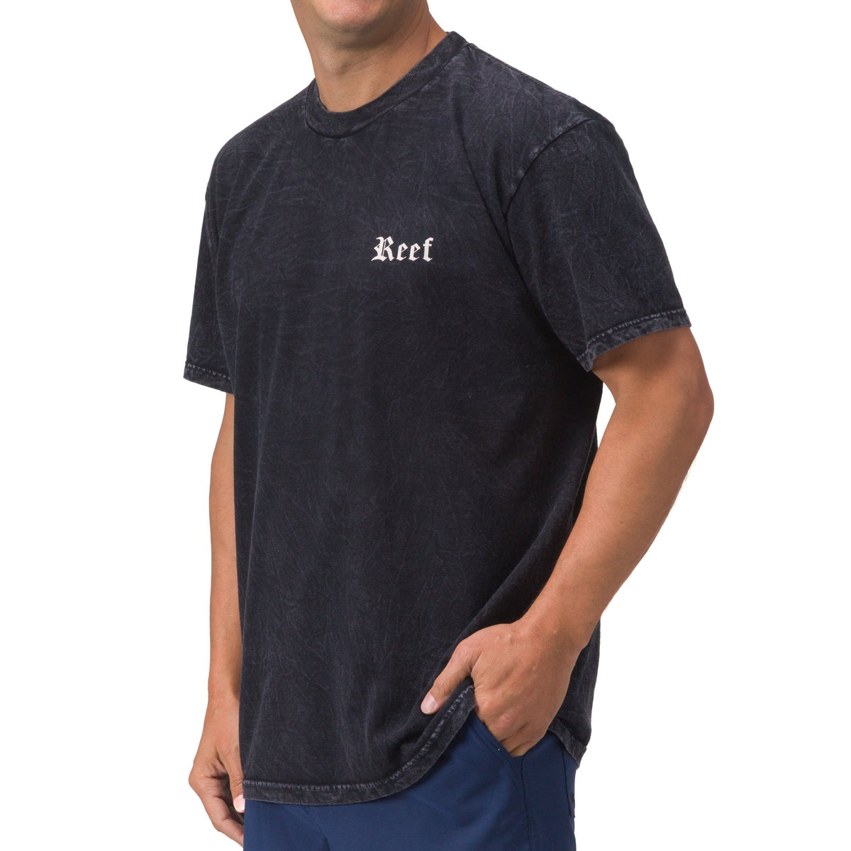 Men's Pray Tee in washed black with Reef logo, relaxed fit, short sleeves, styled for casual beach comfort and durability.