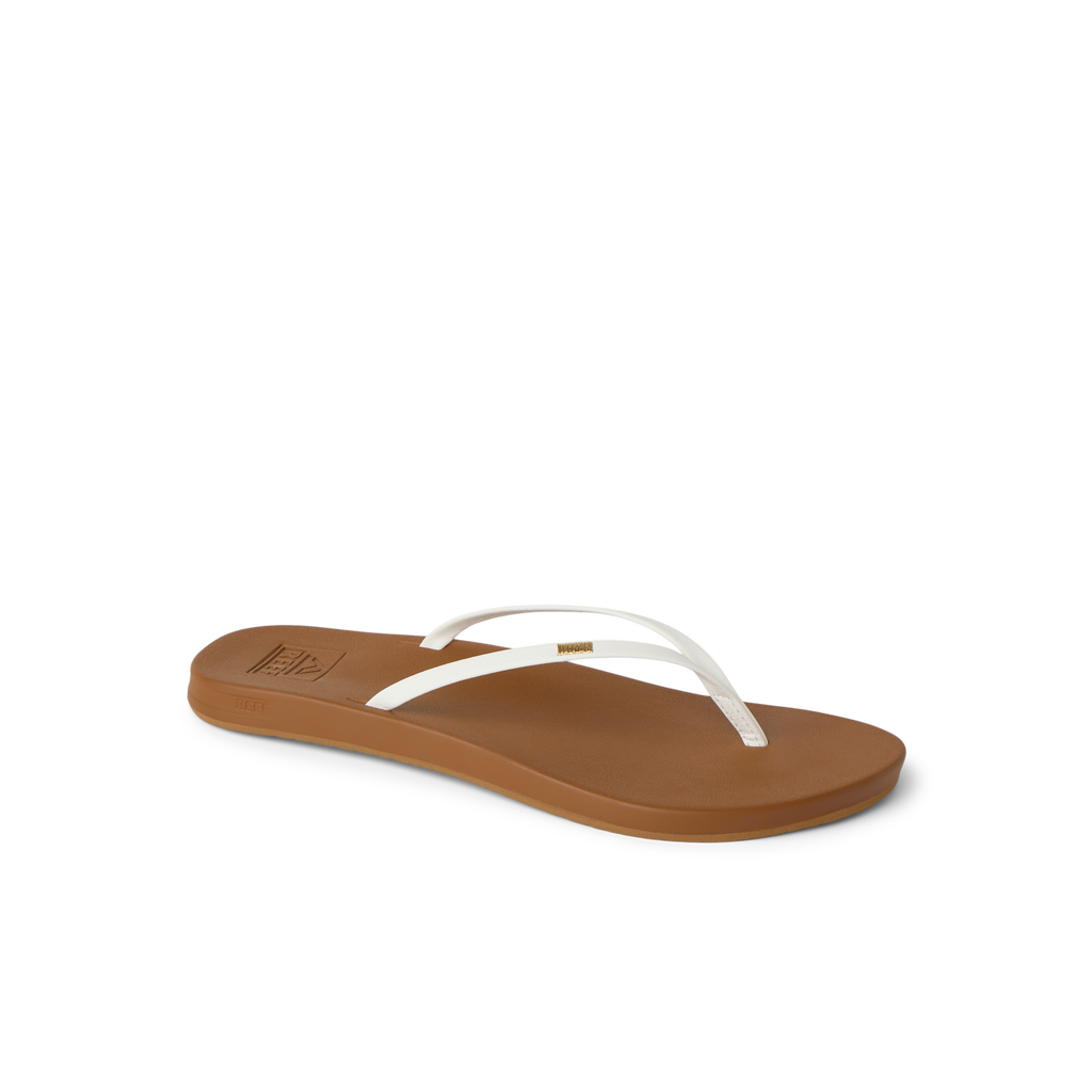 Cushion Slim white and tan flip flop facing right with anatomical arch support and soft cushioning for beach comfort.