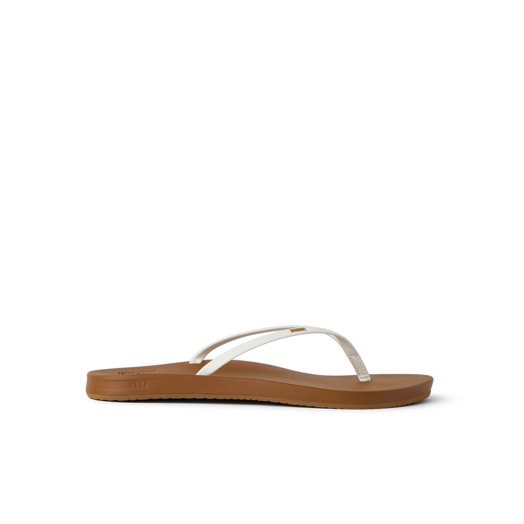 Cushion Slim white and tan women's flip flop facing left, showcasing water-friendly lightweight comfort and arch support.