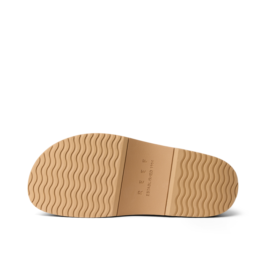 Vista Skye women's shoe sole facing up in caramel with wave tread, featuring durable, water-friendly REEF comfort design.