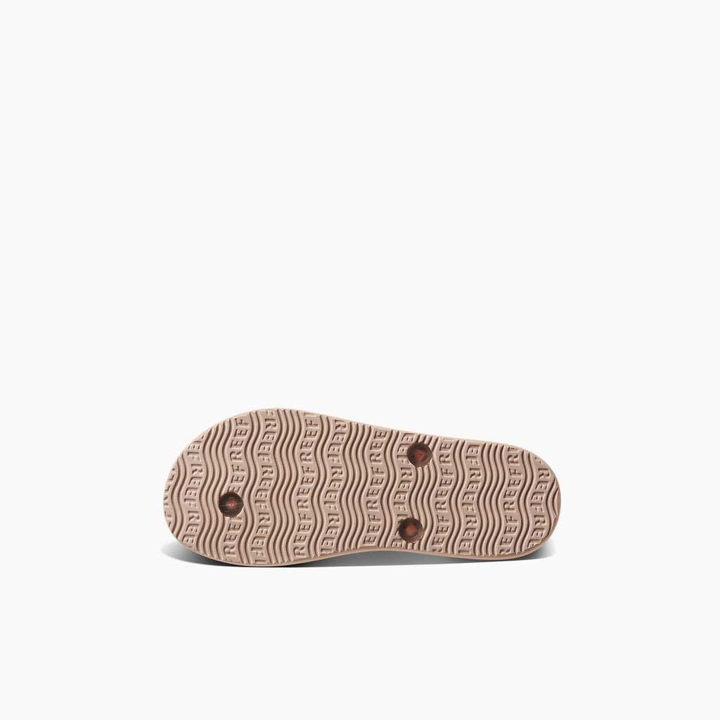 Kids Charming girls’ footwear bottom sole facing up showing durable tread with anatomical arch support and cushioning.