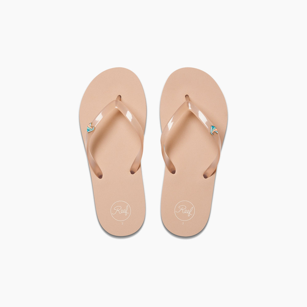 Kids Charming beige flip flops for girls, top view showing toe straps with reef logo, beach inspired comfort sandals.