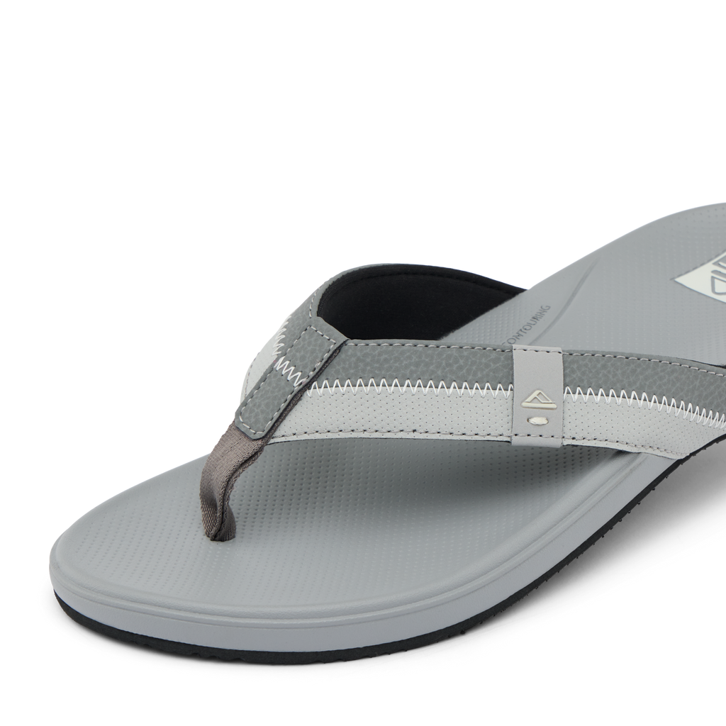 Cushion Phantom 2.0 men’s sandal facing left, close-up of grey soft-rebound cushioned toe strap and footbed.