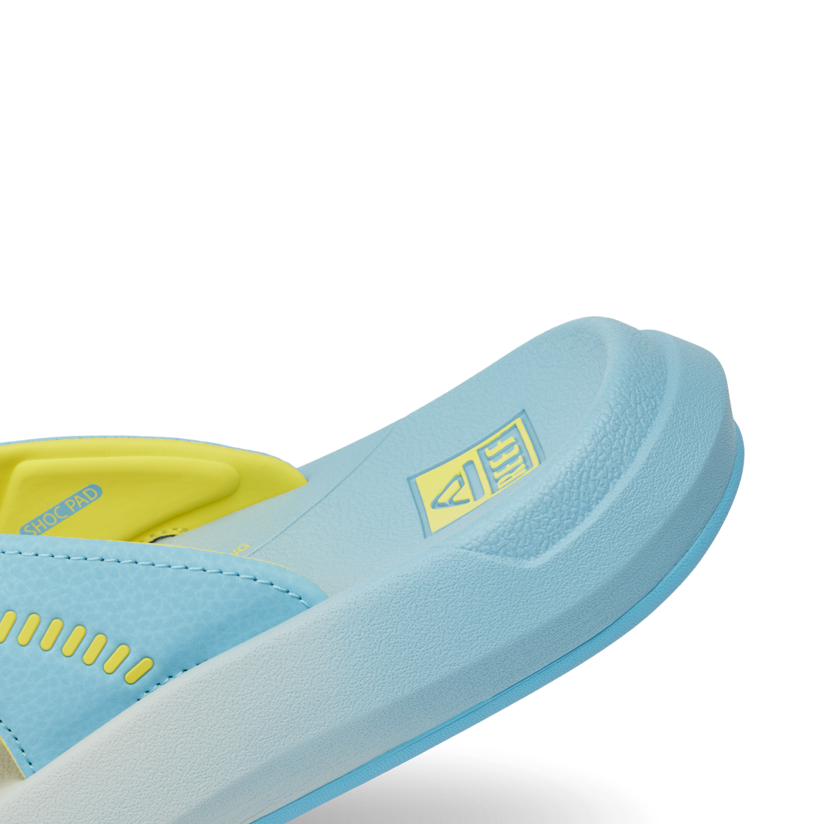 Close-up of the left front side of the Cruiser sandal in light blue and yellow, showing cushioned sole and arch support.