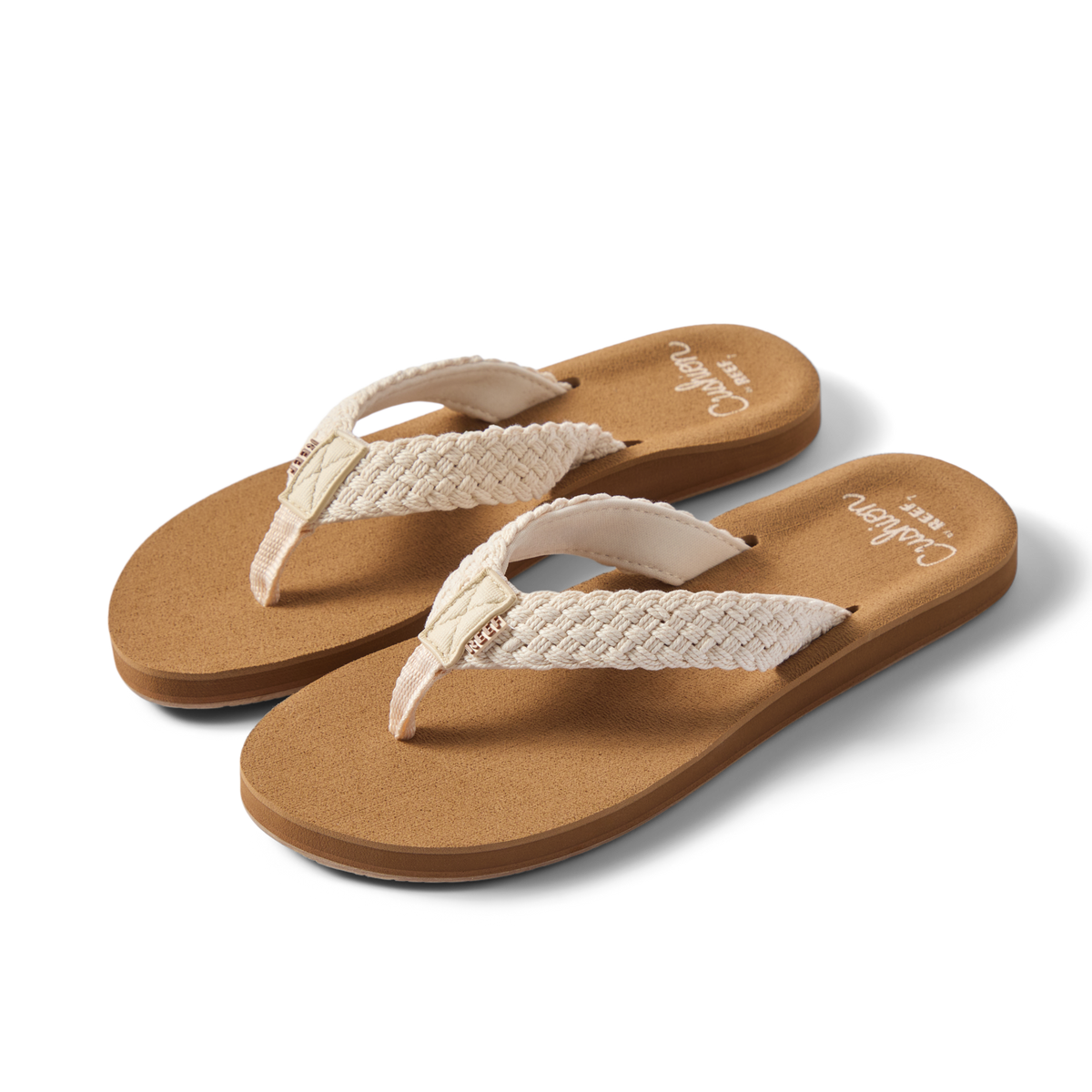 Pair of Baja Maria sandals for women facing left, featuring braided straps and cushioned footbeds for beach comfort.