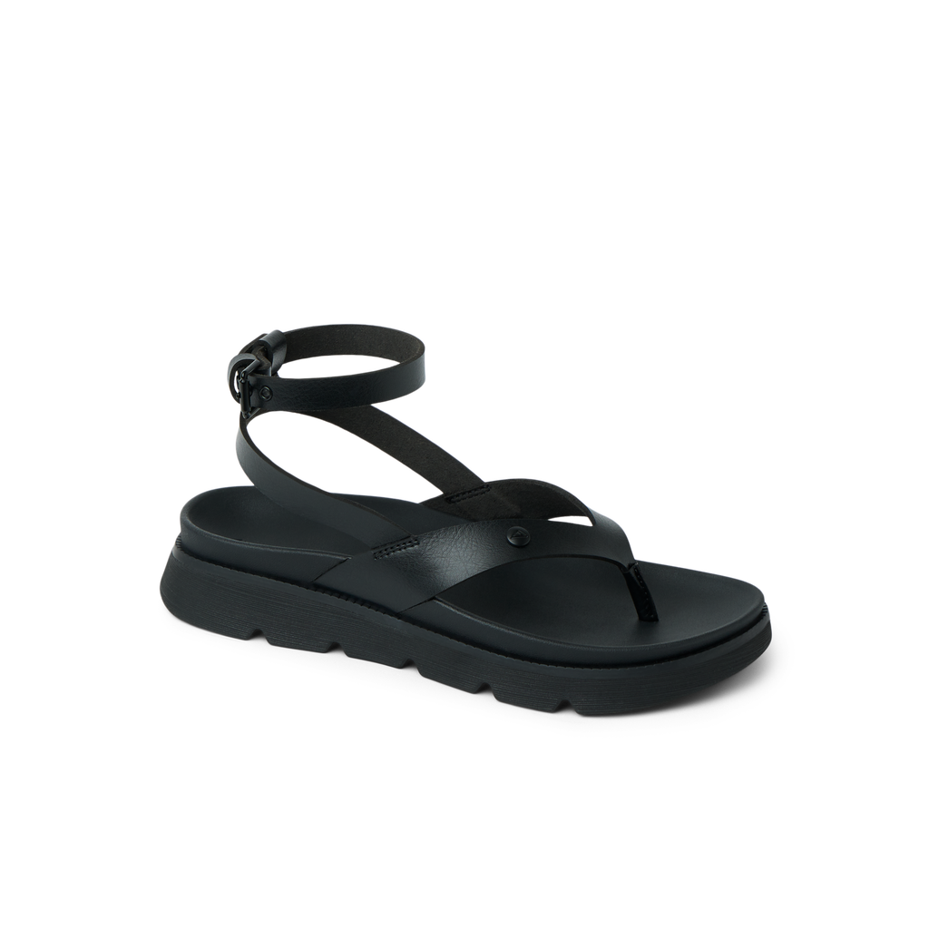 Vista Luxe Sierra black women's sandal facing right, featuring ankle strap and cushioned sole for beach comfort