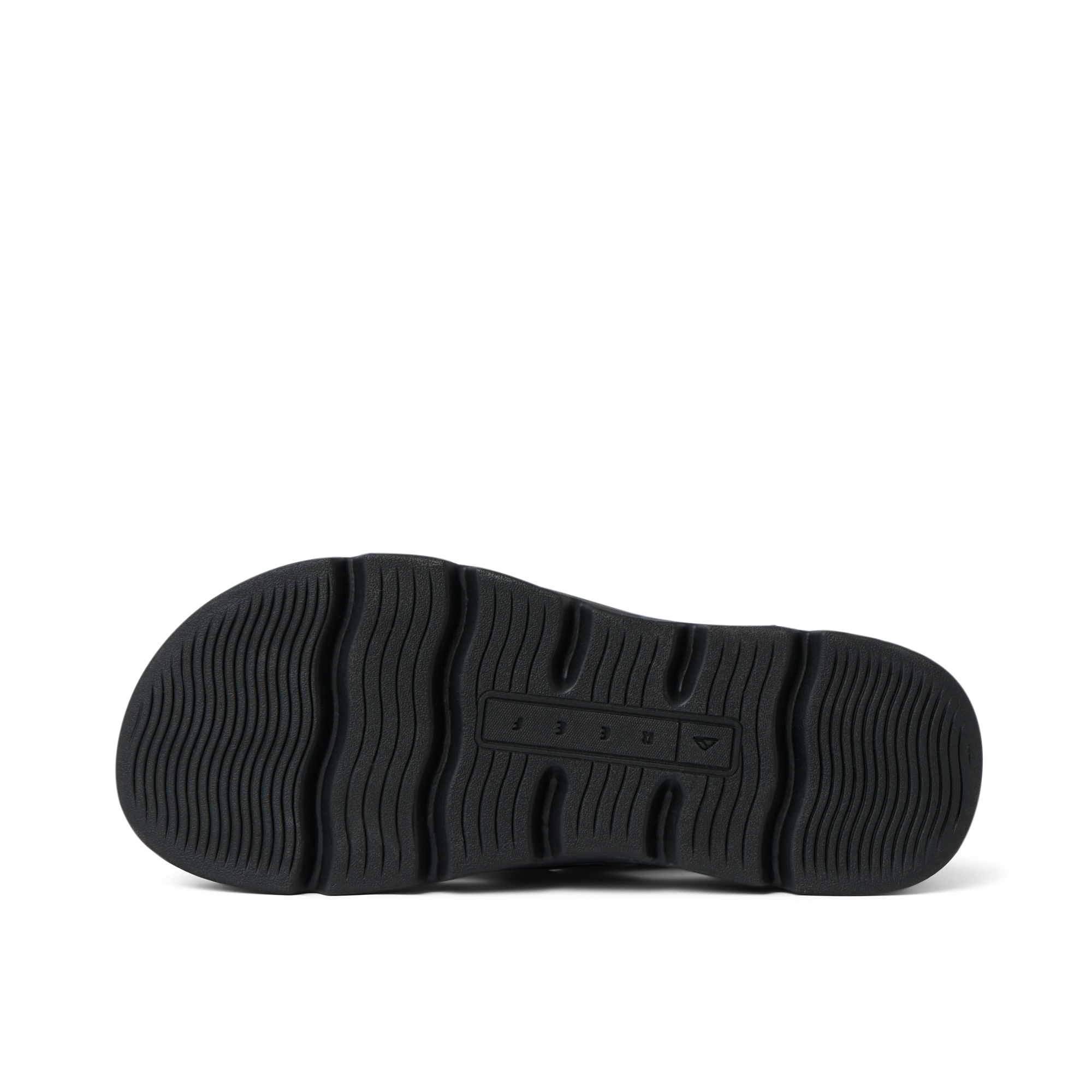 Vista Luxe Sierra black shoe sole facing up, showing wave-patterned tread with REEF logo and comfort-focused design.