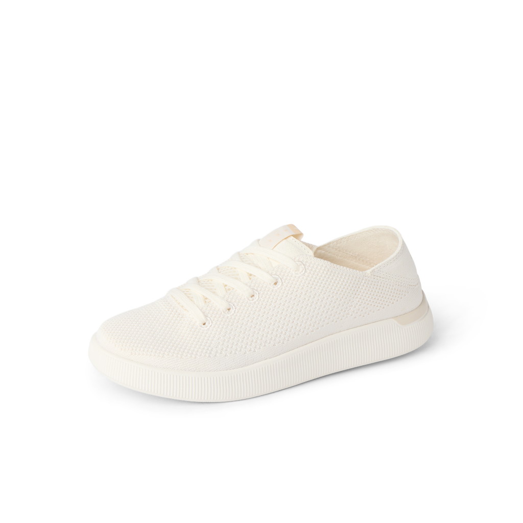 Reef Neptune women's cream knit sneaker facing left, breathable, lightweight, anatomically supportive, beach-inspired comfort.