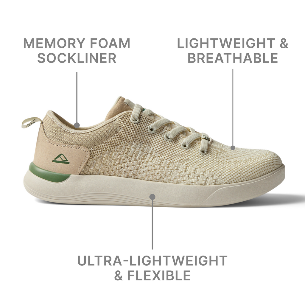 Side view of the beige Neso sneaker facing right with memory foam sockliner and breathable mesh upper