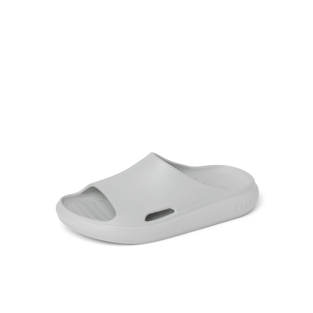Kids Rio Slide in light grey facing right, close-up of top and outer side showing water-friendly, cushioned, arch-support design.