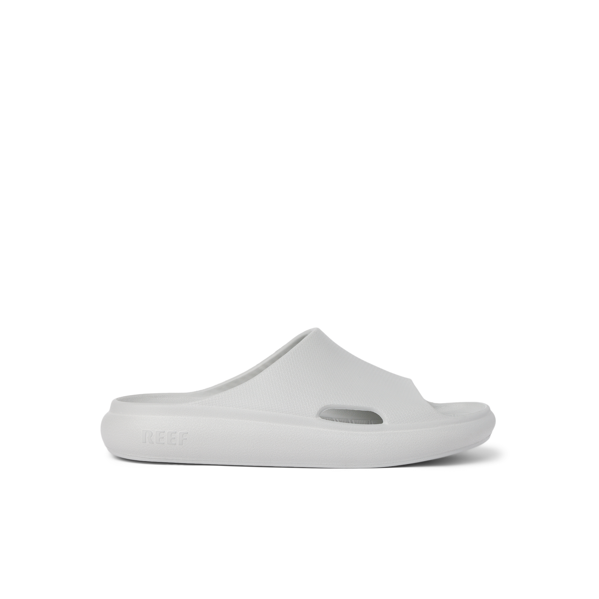 Kids Rio Slide in light grey facing right, close-up side view showcasing lightweight, water-friendly, cushioned slide for kids.