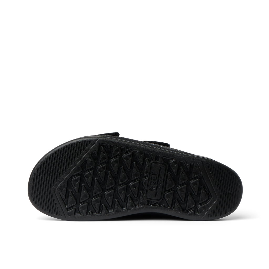 Phantom Tradewind black men's shoe sole facing up, showing durable, water-friendly, comfort-focused tread design.