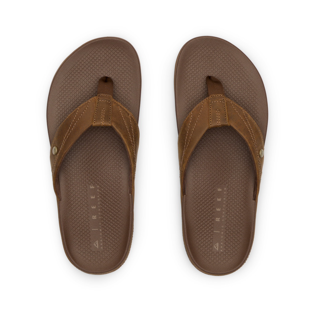 Top view of Phantom Lux men's brown flip flops with anatomical arch support and soft-rebound cushioning for beach comfort.