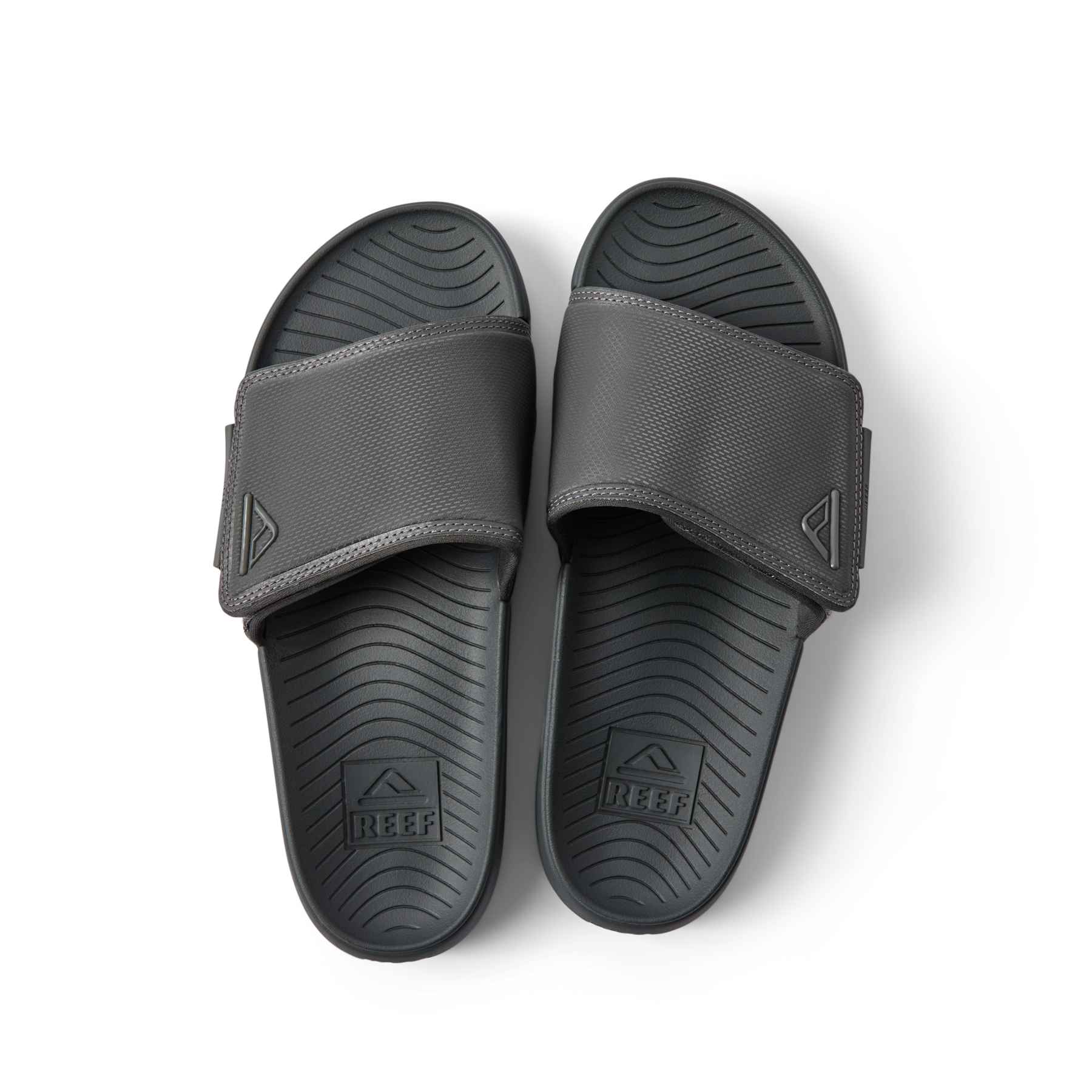 Top view of black Phantom Slab men's slides facing upward, featuring soft-rebound cushioning and anatomical arch support.