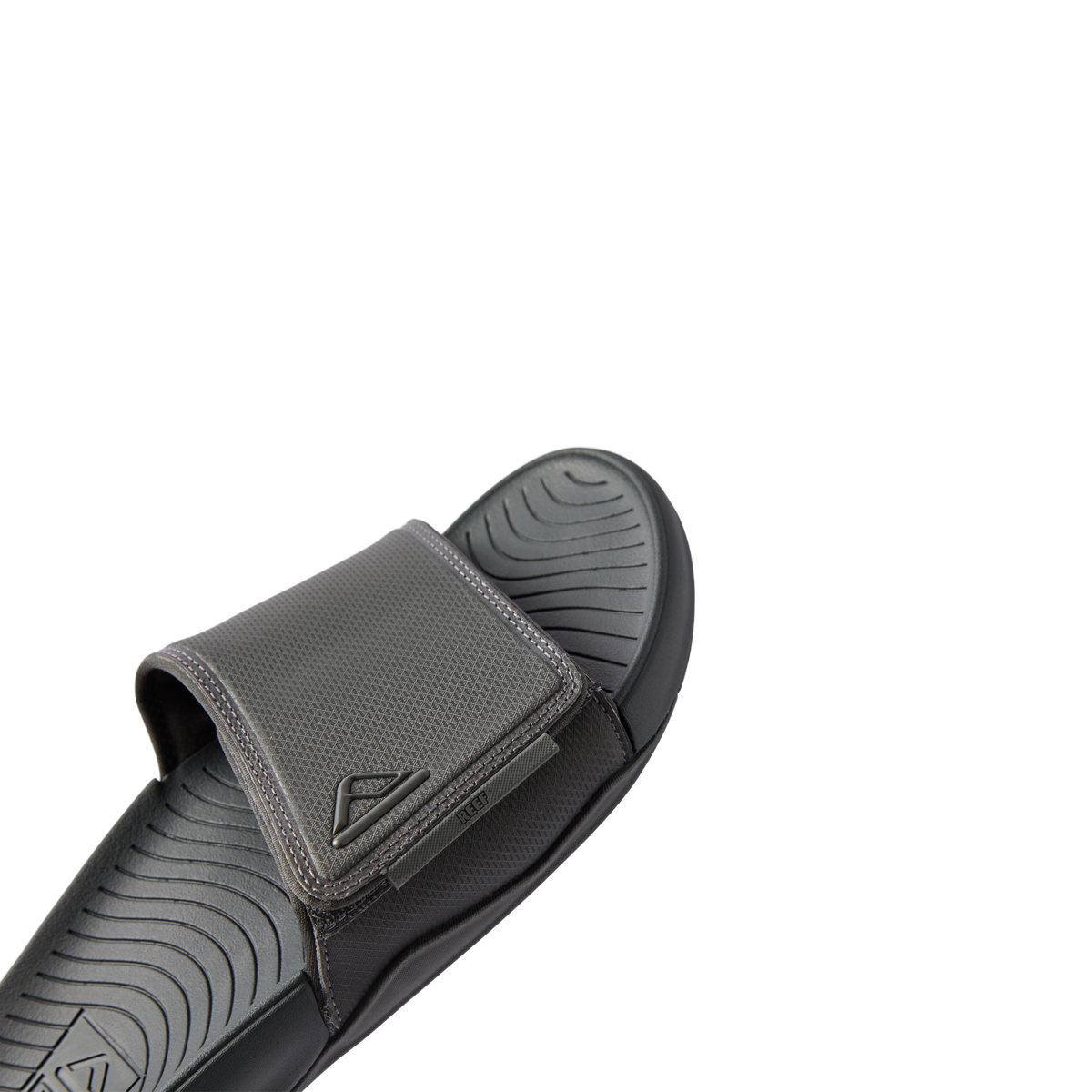 Phantom Slab men’s black slide sandal facing left showing top and footbed with soft-rebound cushioning and arch support
