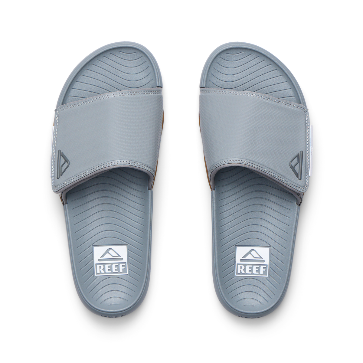 Phantom Slab men's slides in grey facing upward, featuring water-friendly materials and anatomical arch support for comfort.