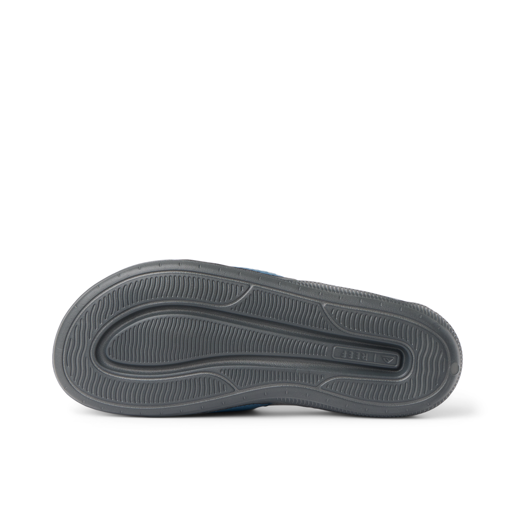 Tailslide footwear sole facing up, showcasing lightweight, durable, water-friendly design with anatomical arch support by REEF.
