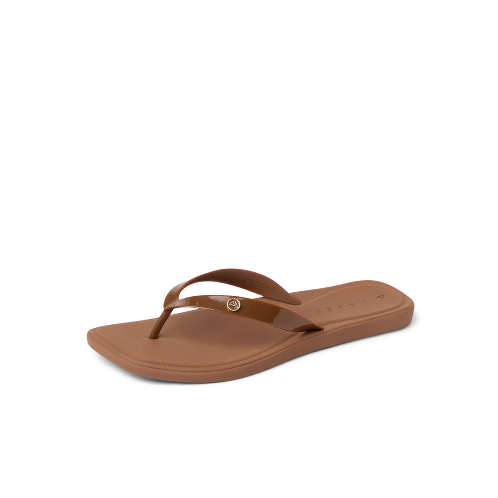 Solaye women's brown flip flop sandal facing left, showing top and side, with arch support and cushioned sole