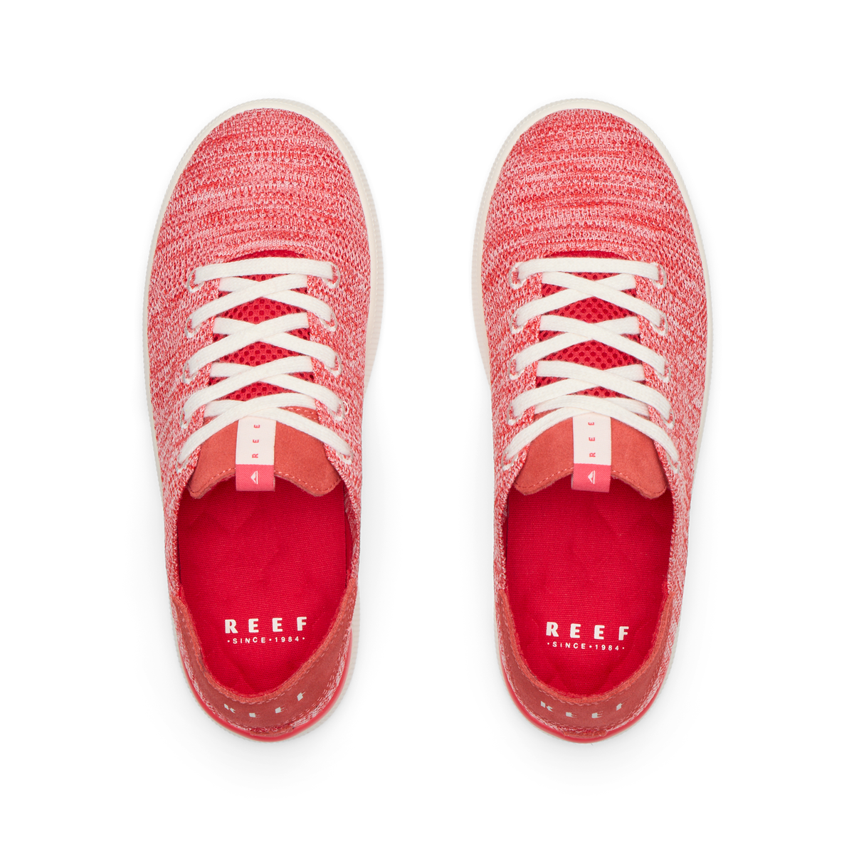 Top view of Reef Neptune women's coral knit sneakers with anatomical arch support and soft cushioning for beach comfort