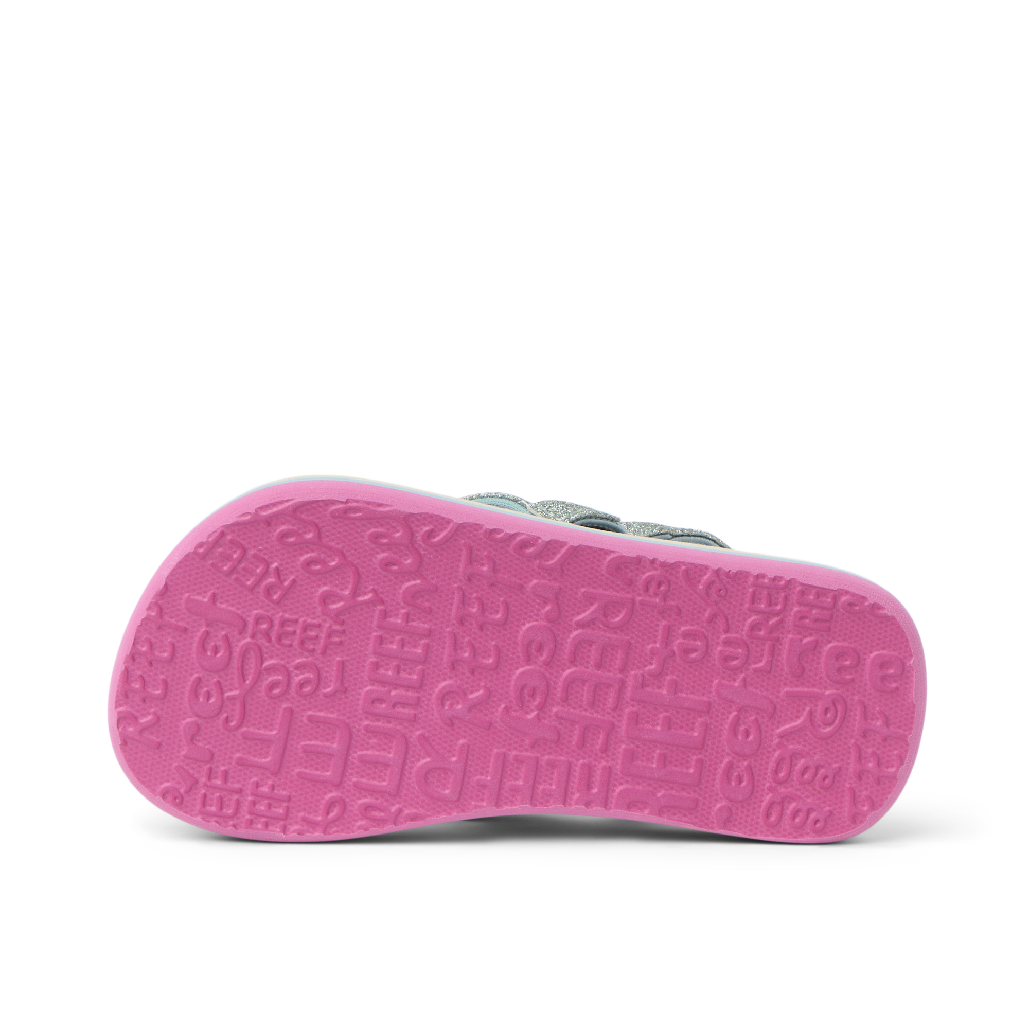 Little Ahi girls’ sandal showing bottom sole facing up with pink textured REEF logo pattern, beach comfort design.