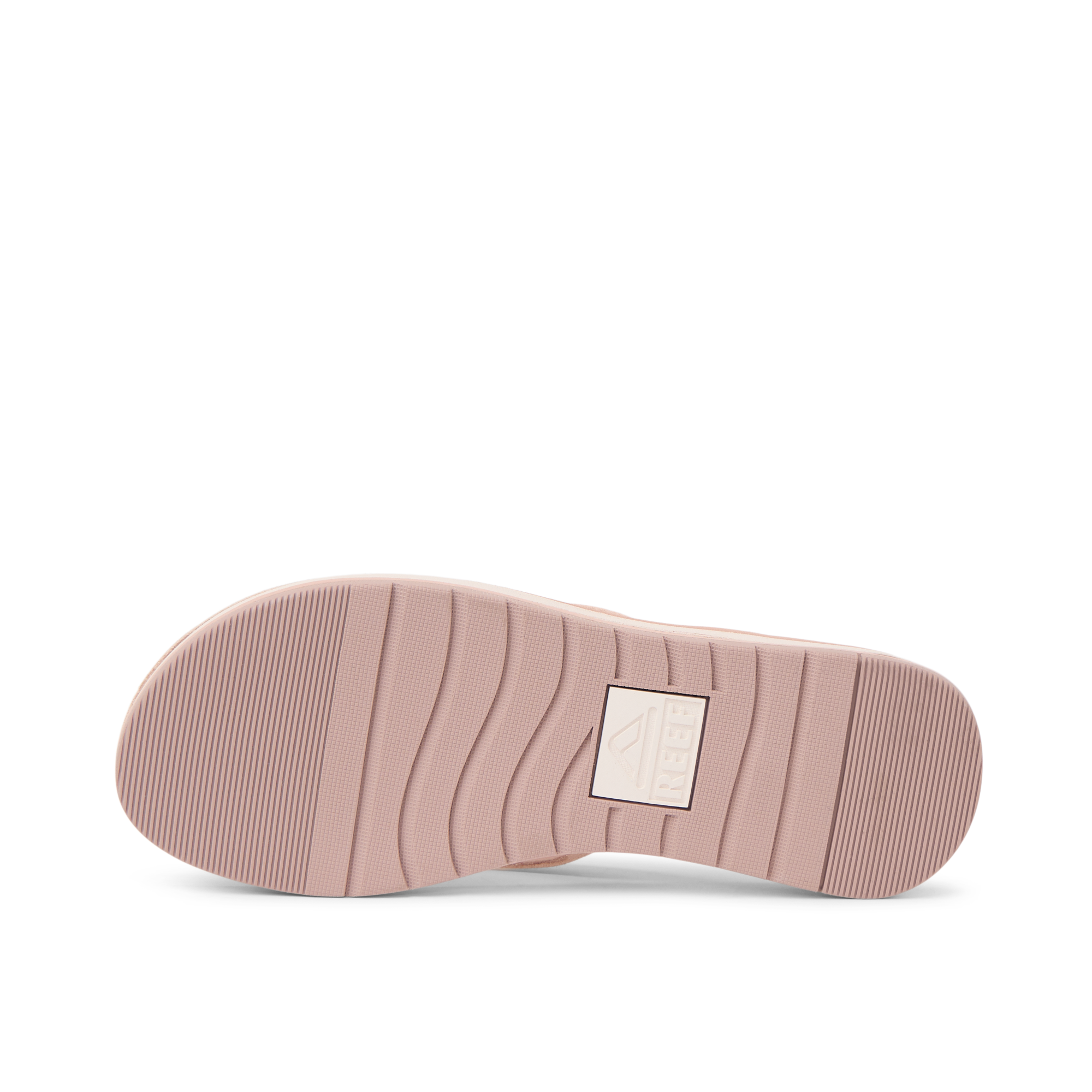 Ojai Classic Slim shoe sole facing up, showing durable textured outsole with anatomical arch support in blush suede color.