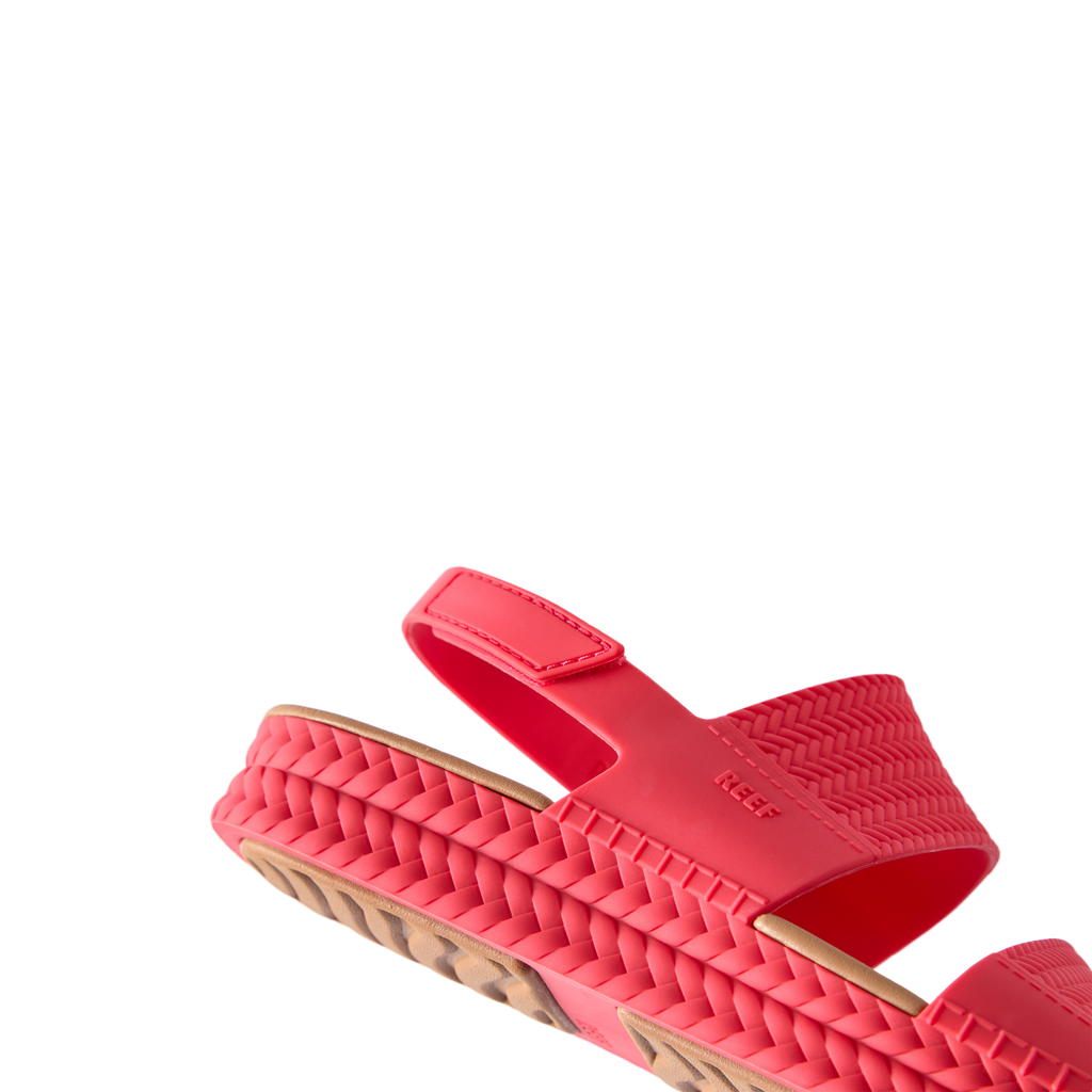 Reef Water Vista women's red platform sandal facing left, showcasing cushioned sole and adjustable strap for comfort.