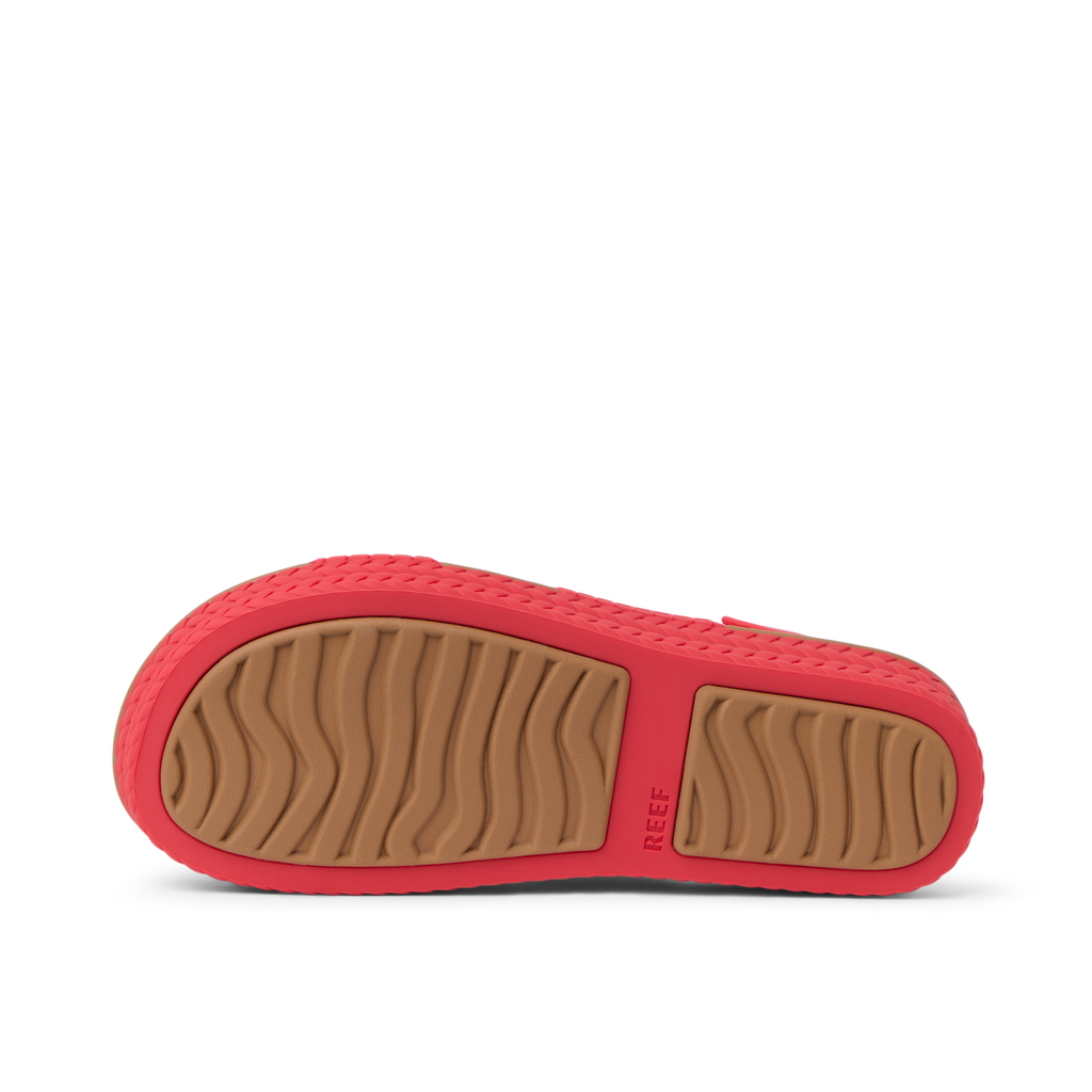 Reef Water Vista women's sandal bottom sole facing up, showing durable, water-friendly, comfort-focused outsole design.