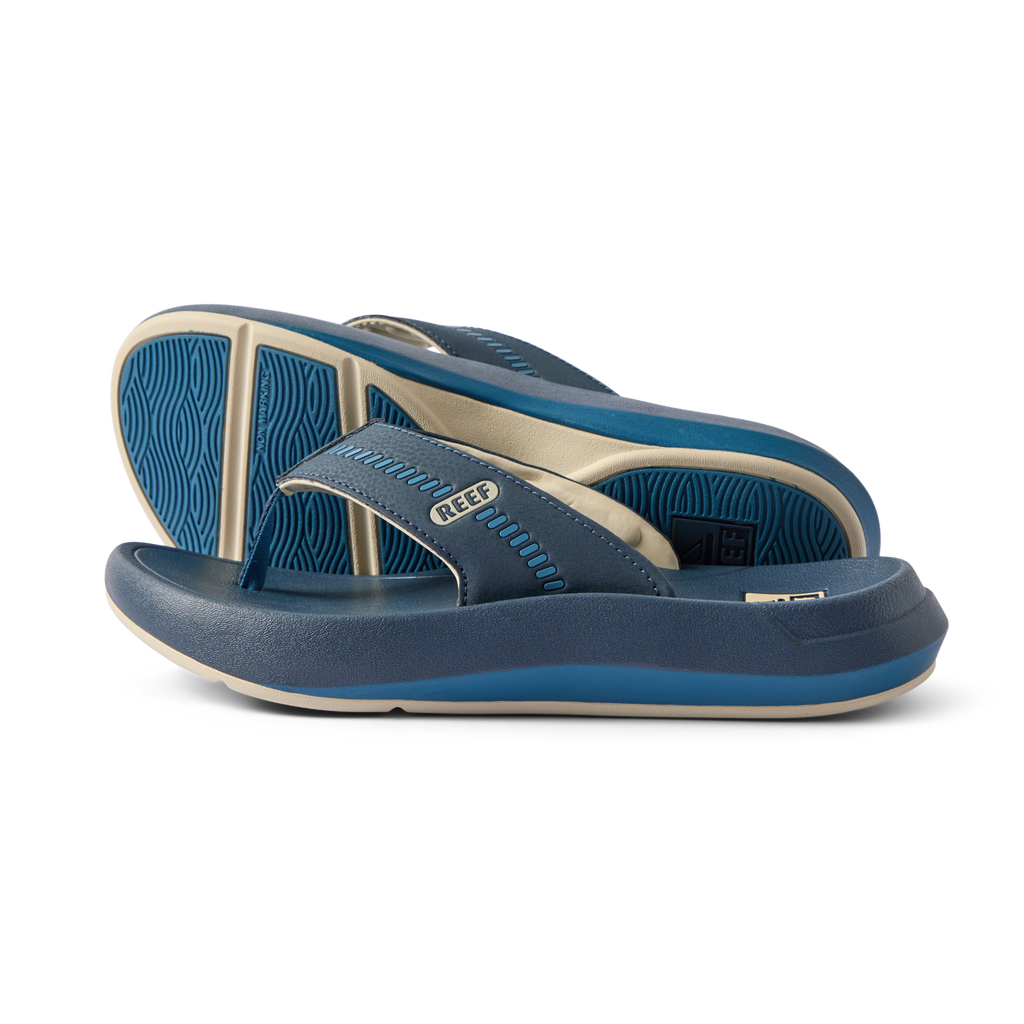 Pair of Cruiser sandals in midnight navy facing left, showing top and sole with anatomical arch support and cushioning