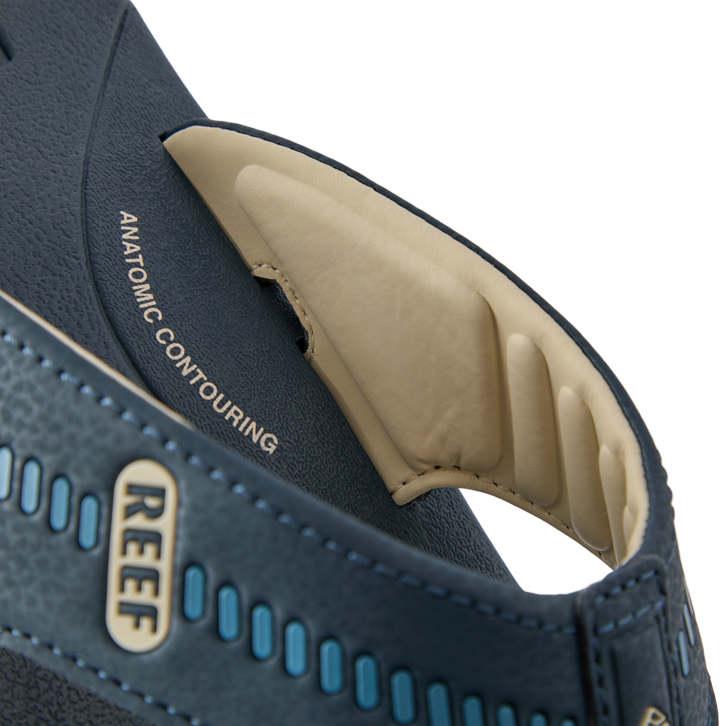 Close-up of the Cruiser sandal heel facing left, showing anatomical arch support and soft cushioning in midnight navy color.