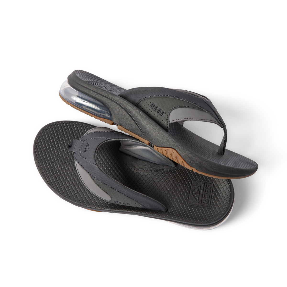 Fanning + men’s black flip flops with arch support and cushioned sole, right footwear side view and sole close-up shot