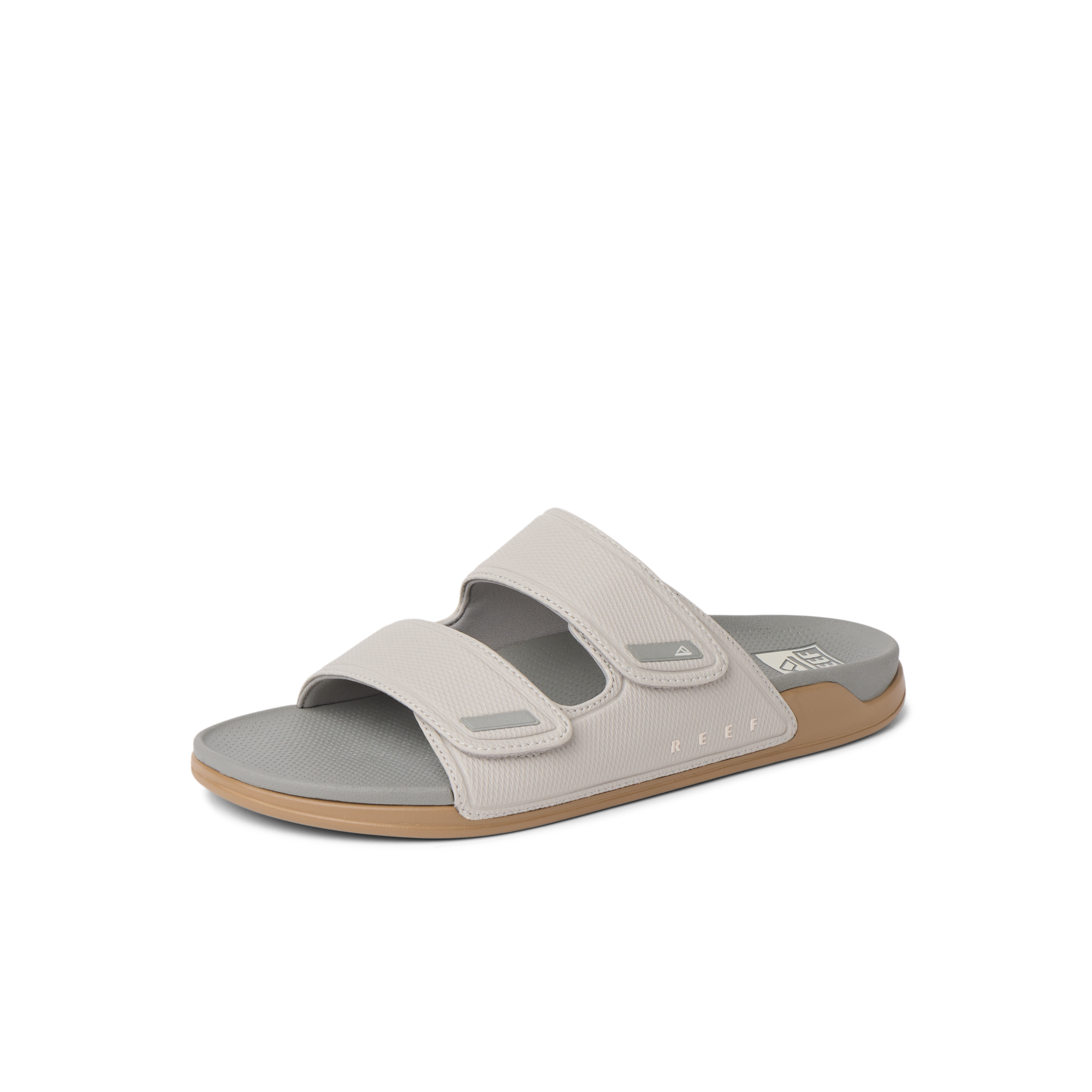 Phantom Tradewind men's sandal facing right, close-up of cushioned sole and ergonomic straps for beach comfort.