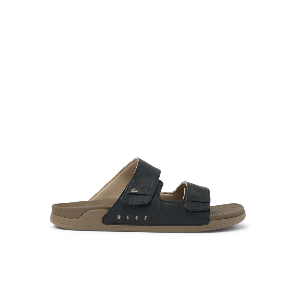 Phantom Tradewind men's sandal facing right, featuring dual adjustable straps, arch support, and soft cushioning for beach comfort.