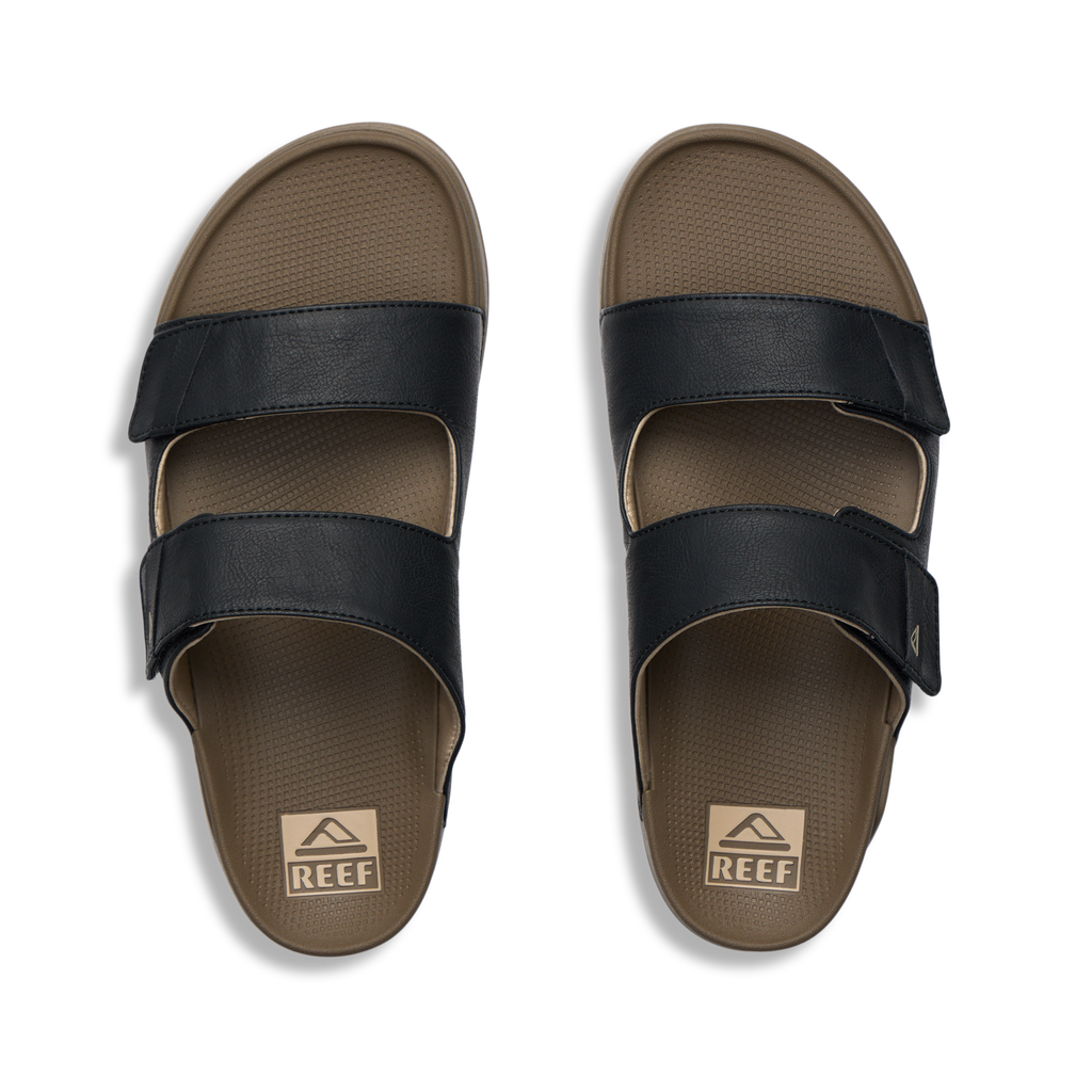 Top-down view of men's Phantom Tradewind sandals in fossil black with dual straps, designed for beach comfort and durability.