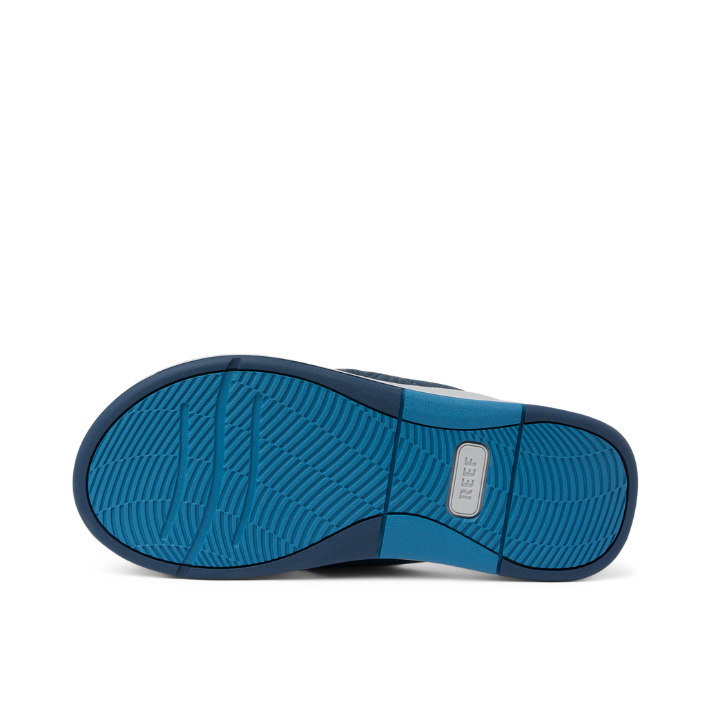 Offshore men's shoe sole facing up, showcasing durable water-friendly outsole with anatomical arch support and cushioning.