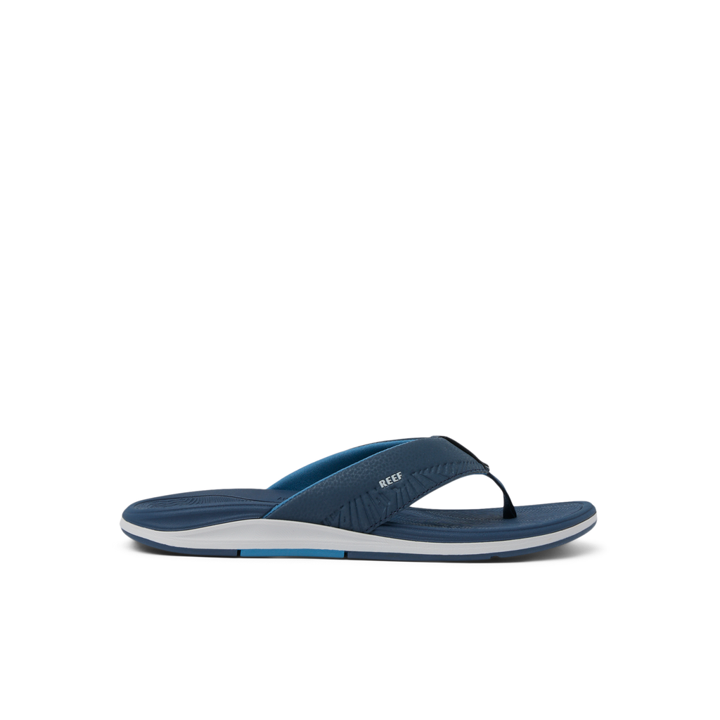Offshore men's navy blue flip flop facing right with extra cushioning and anatomical arch support for beach comfort