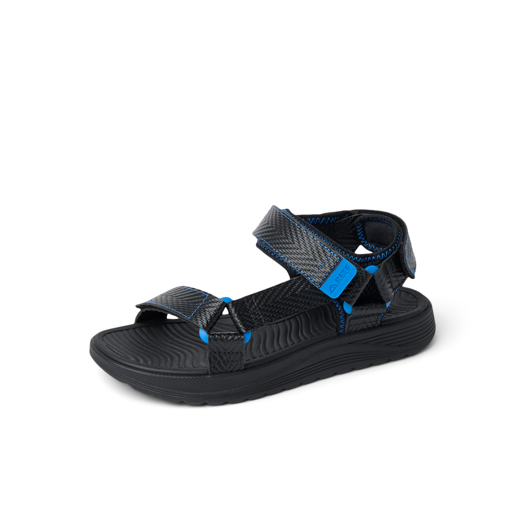 Kids Shoremazing sandal facing left, black and blue with anatomical arch support and soft cushioning for comfort.