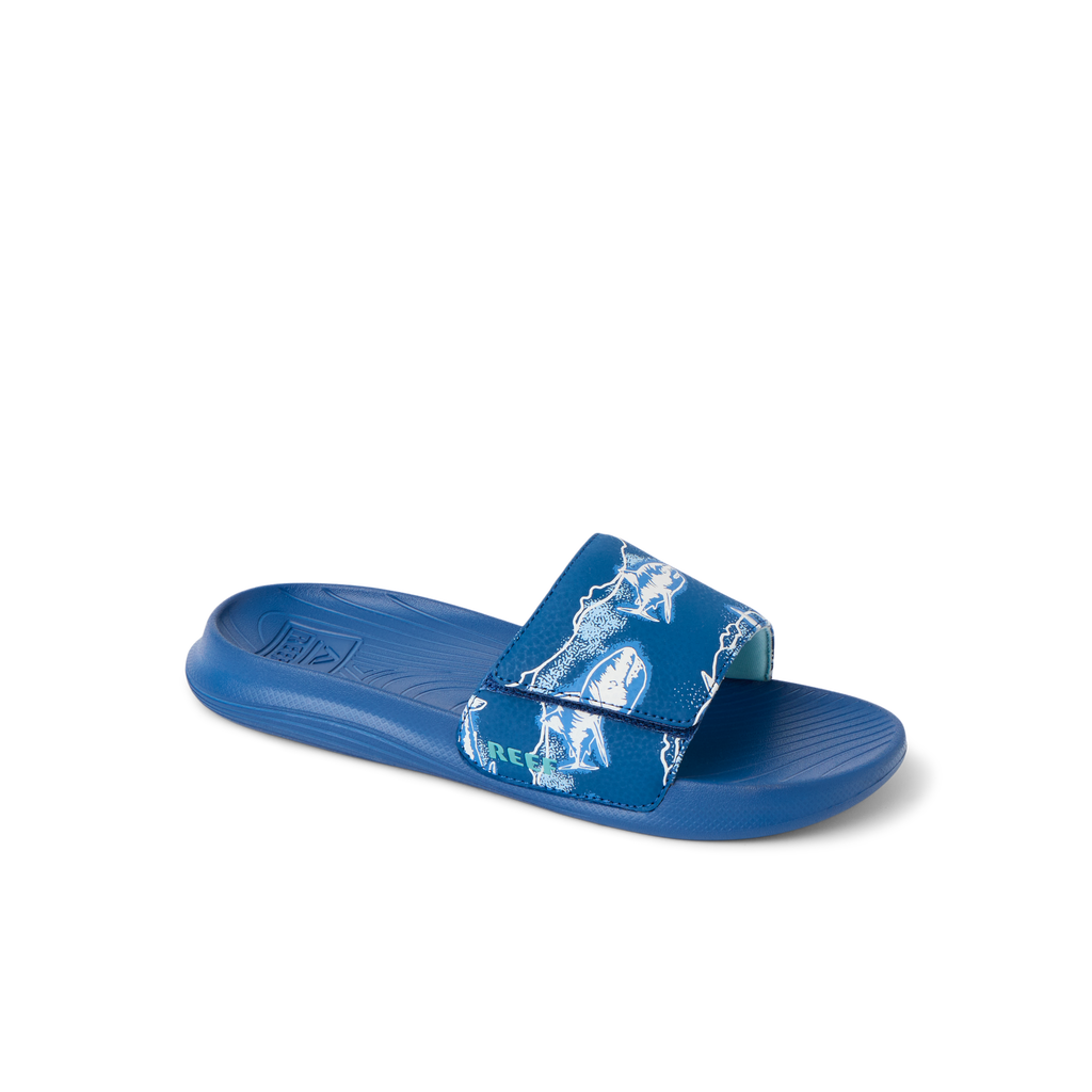 Kids Salty Slide facing right, close-up of upper and sole showing water-friendly, cushioned comfort for boys.