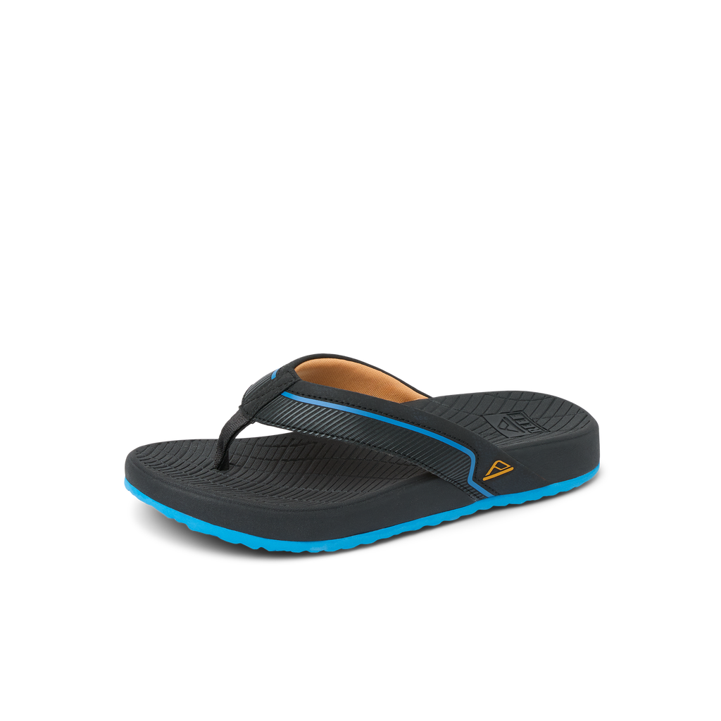 Kids Windswell right-facing black and blue flip flop with anatomical arch support and soft-rebound cushioning close-up