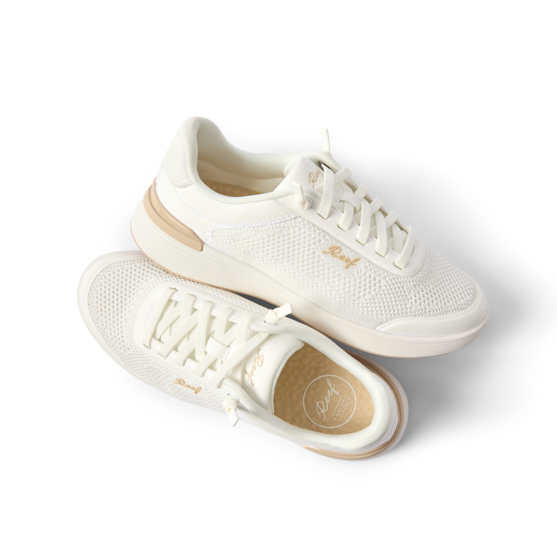 Shoreline Palisades women's white sneaker pair with right shoe facing up, showcasing comfort and surf-inspired design.