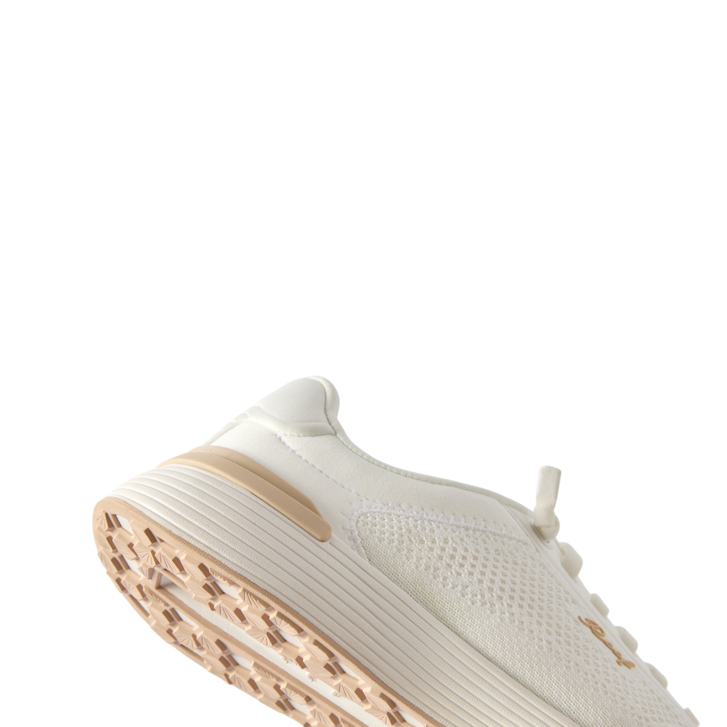 Side view of Shoreline Palisades white sneaker for women featuring soft cushioning and anatomical arch support.